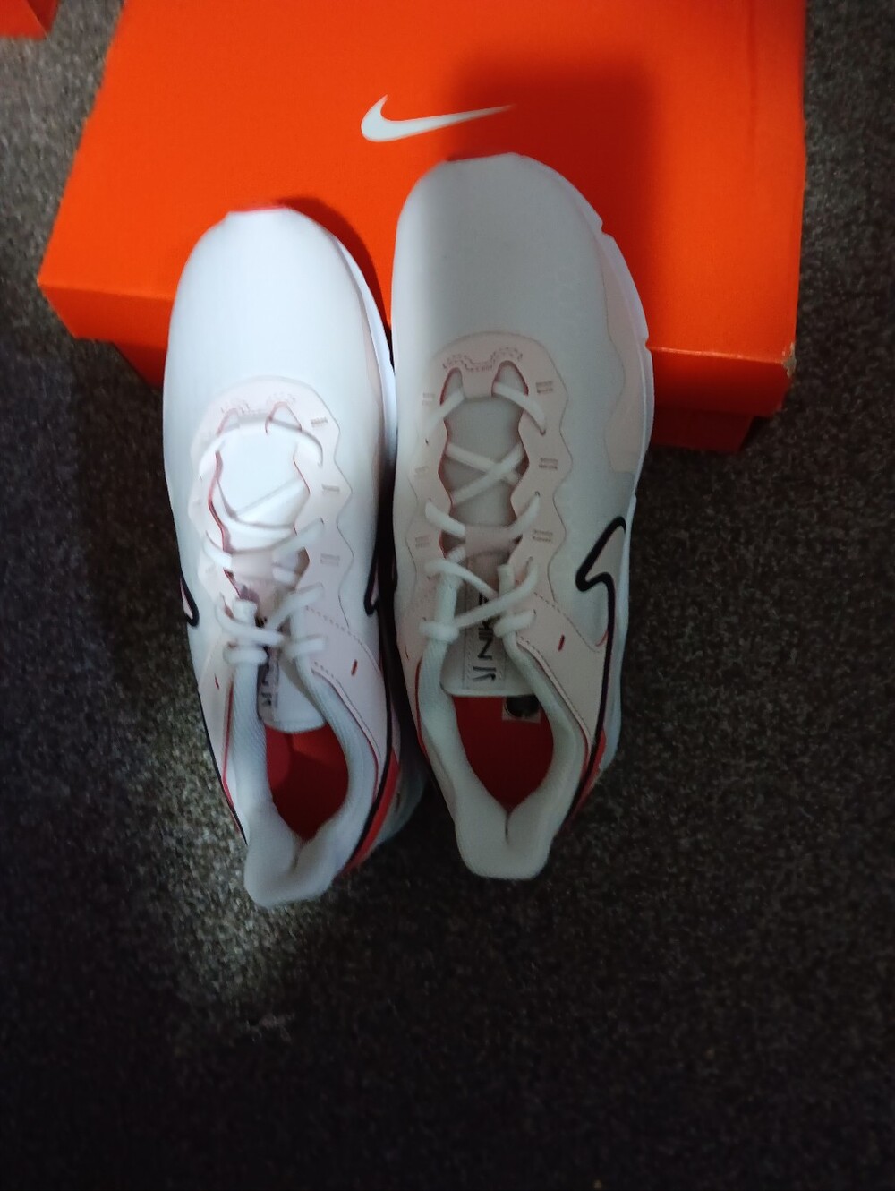 Nike White Kids' Sneakers with Red Accents
